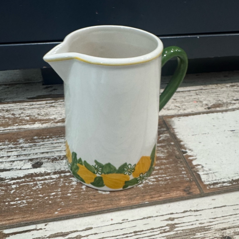 Floral Ceramic Pitcher with Green Handle